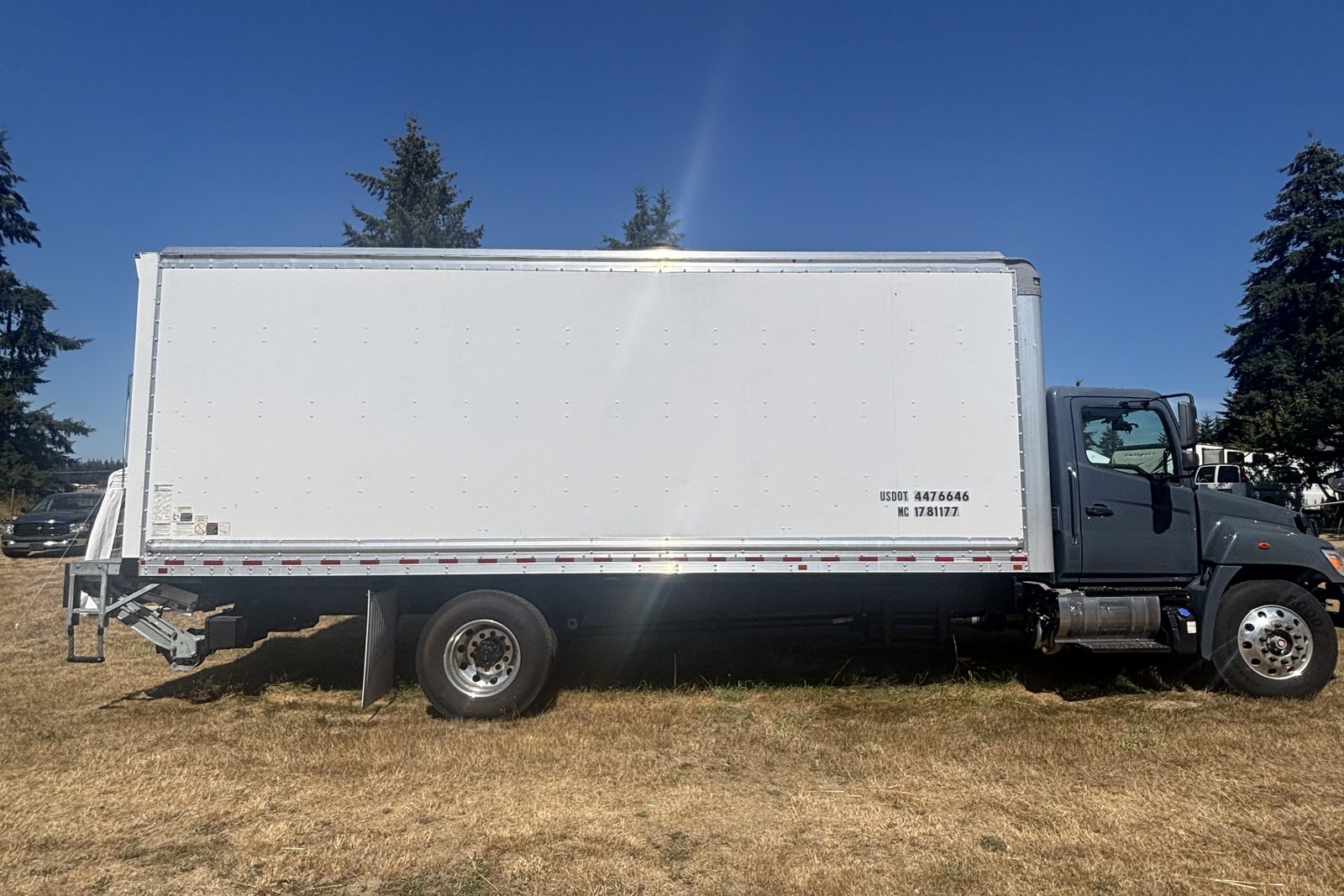 Caravan Moving's 24-foot box truck, side view